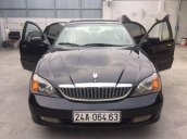 Bán xe Daewoo Magnus đời 2004, màu đen số tự động, 135 triệu