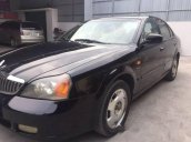 Bán xe Daewoo Magnus đời 2004, màu đen số tự động, 135 triệu