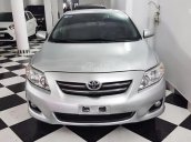 Bán ô tô Toyota Corolla Altis 1.8G MT đời 2010, màu bạc số sàn