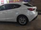 Cần bán xe Mazda 3 đời 2016, màu trắng đã đi 18000km