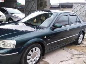 Bán xe Ford Laser GHIA 1.8 AT đời 2005, màu xanh  