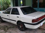 Cần bán gấp Mazda 323 đời 1995, màu trắng, nhập khẩu ít sử dụng, giá tốt