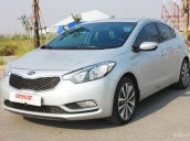 Cần bán Kia K3 1.6AT 2015, màu bạc odo chuẩn 35000km  full option