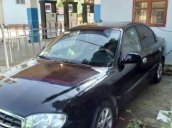 Bán xe Kia Spectra đời 2005, màu đen