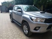 Bán Toyota Hilux 2.5E đời 2016, màu bạc như mới