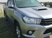 Bán Toyota Hilux 2.5E đời 2016, màu bạc như mới