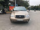 Bán xe Kia Carnival GS 2.5AT đời 2009, màu vàng cát