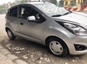 Bán Chevrolet Spark LS đời 2015, màu bạc  