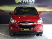 Bán xe Hyundai Tucson 2.0AT 4WD đời 2010, màu đỏ