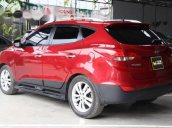 Bán xe Hyundai Tucson 2.0AT 4WD đời 2010, màu đỏ