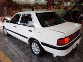 Cần bán lại xe Mazda 323 đời 1997, màu trắng, nhập khẩu nguyên chiếc chính chủ, 85 triệu