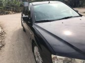 Bán lại xe Ford Mondeo năm 2004, màu đen như mới