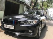 Bán xe BMW 3 Series 320i đời 2014, màu đen