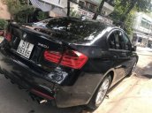 Bán xe BMW 3 Series 320i đời 2014, màu đen