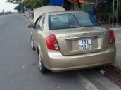 Cần bán xe Daewoo Lacetti đời 2004, màu ghi vàng  