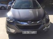 Cần bán lại xe Hyundai Tucson đời 2011, màu nâu, 558 triệu