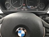 Bán BMW 320i 2016, màu đen, đk 2017
