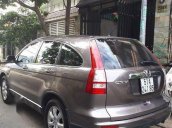 Cần bán gấp Honda CR V đời 2011, màu nâu chính chủ, 590 triệu