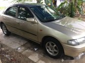 Bán lại xe Mazda 323 đời 1998, màu vàng