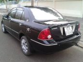 Bán Ford Laser 1.8L Ghia đời 2005, màu đen xe gia đình, 245 triệu