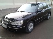 Bán Ford Laser 1.8L Ghia đời 2005, màu đen xe gia đình, 245 triệu