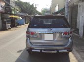 Ít dùng bán Fortuner 2014, máy xăng tự động, màu bạc đẹp như mới