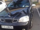 Cần bán gấp Daewoo Lacetti đời 2005, màu đen xe gia đình