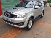 Cần bán gấp Toyota Fortuner G đời 2014, màu bạc số sàn