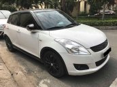 Cần bán xe Suzuki Swift 2016 đen trắng, giá tốt