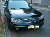 Cần bán Ford Laser 1.8AT 2004, màu đen, giá 238tr