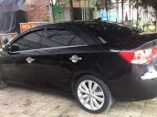 Cần bán Kia Forte đời 2011, màu đen