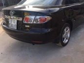 Cần bán Mazda 6 đời 2004, màu đen xe gia đình, giá 310tr