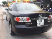 Cần bán Mazda 6 đời 2004, màu đen xe gia đình, giá 310tr