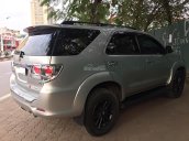 Cần bán xe Toyota Fortuner 2.7AT 2014, màu bạc, một chủ từ đầu