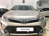 Bán xe Toyota Camry 2.0 E năm 2015, màu ghi vàng