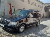 Bán Kia Carnival đời 2006, màu đen, xe nhập xe gia đình, giá 250tr