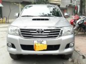 Bán xe Toyota Hilux E sản xuất 2014, màu bạc số sàn, giá tốt