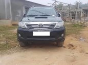 Cần bán Toyota Fortuner 2.5G đời 2014, màu đen số sàn