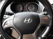 Bán Hyundai Tucson đời 2011, màu đen  