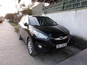 Bán Hyundai Tucson đời 2011, màu đen  