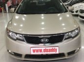 Bán xe Kia Forte 1.6AT đời 2011, màu vàng