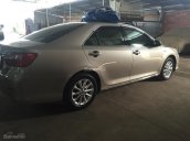 Cần bán lại xe Toyota Camry E đời 2014, màu vàng