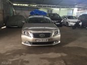 Cần bán lại xe Toyota Camry E đời 2014, màu vàng