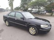 Bán Ford Laser đời 2004, màu đen, 228 triệu