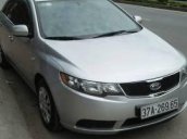 Bán xe Kia Forte đời 2010, màu bạc như mới