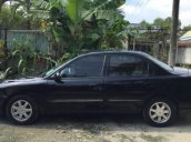 Bán xe Kia Spectra đời 2004, màu đen chính chủ giá cạnh tranh