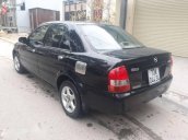 Bán xe Mazda 323 đời 2002, màu đen chính chủ, 165tr