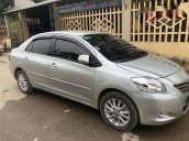 Bán xe Toyota Vios E đời 2011, màu bạc số sàn