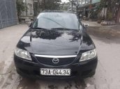 Bán xe Mazda 323 đời 2002, màu đen chính chủ, 165tr