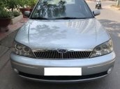 Bán Ford Laser Ghia 1.8MT đời 2003, màu bạc